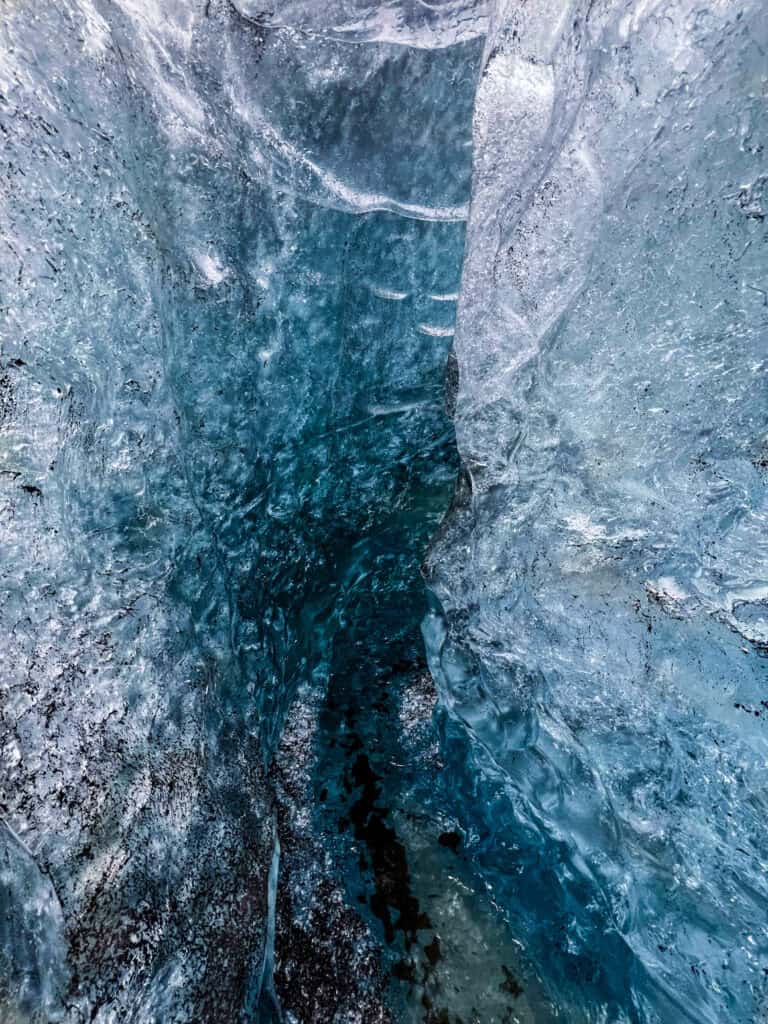 Glacial ice cave with blue hues