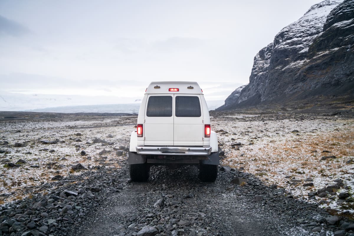 Glacier Trips Super Jeep on the gravel track between Jökulsárlón and the Vatnajökull glacier edge